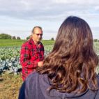 Biobauer auf dem Auenhof vor seinem Acker